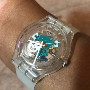 “Random Ghost” transparent swatch watch